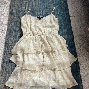 Tired yellow and white sundress